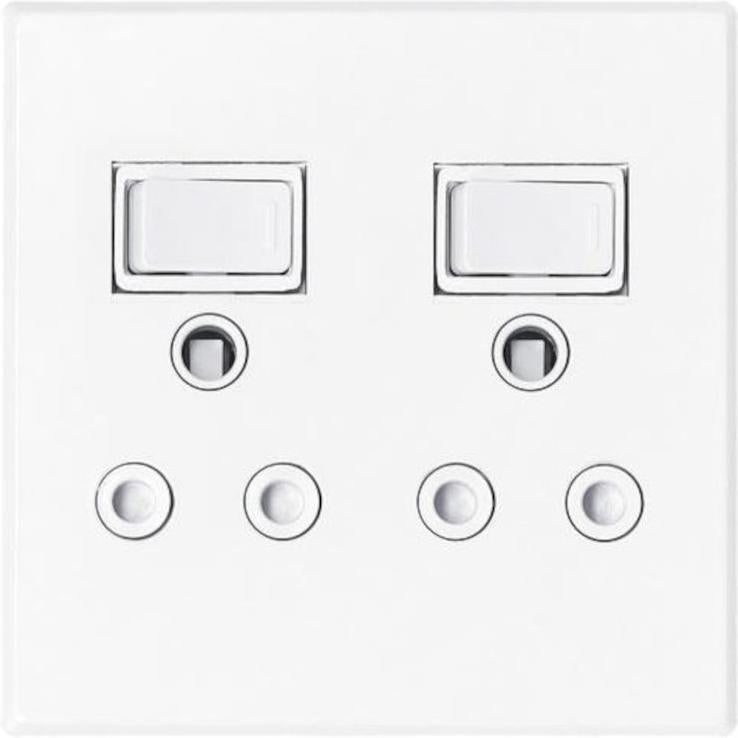White wall switch panel with two rectangular switches and four circular sockets on a white background