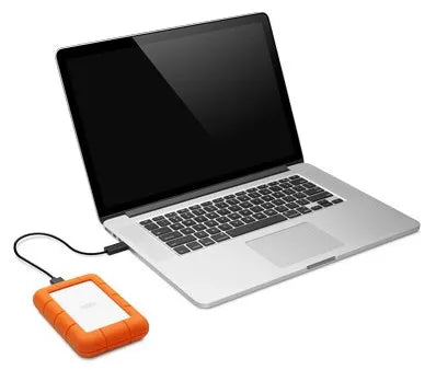 Seagate LaCie Rugged Mini 4TB External Hard Drive – USB 3.0 Portable Drive for Mac connected to laptop, orange rugged case