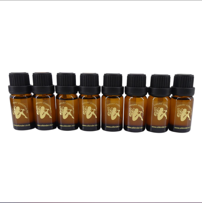 Silkinder Luxury Aromatherapy Essential Oils Collection - 8 Bottles of Pure Bliss (including Ylang-Ylang) displayed.