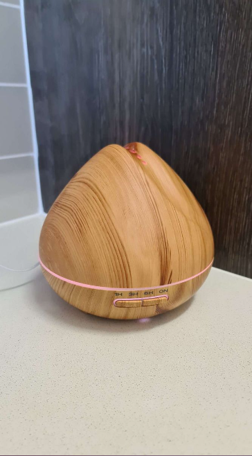 Silkinder Atomiser: 400Ml Peach Light aroma diffuser with wood grain finish, LED light, and soothing mist for home ambiance.