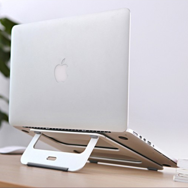 TBYTE Slim Aluminum Laptop Stand - Adjustable Cooling Riser for MacBook/PC elevates laptops for better airflow and ergonomic comfort.