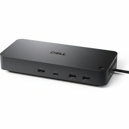 The dock powering a laptop and charging a phone via its front USB-C port.

