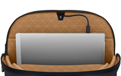 Backpack in use on a commuter trolley suitcase