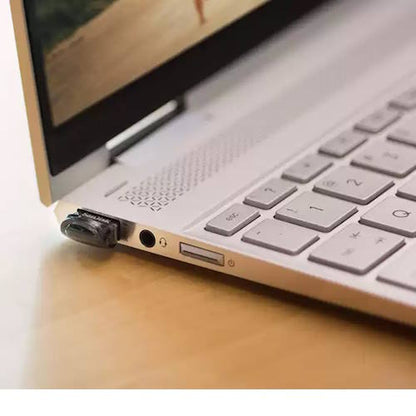 SanDisk Ultra Fit 64GB USB 3.2 Flash Drive – Low Profile, High Speed, Compact – SDCZ430-064G in a laptop USB port.