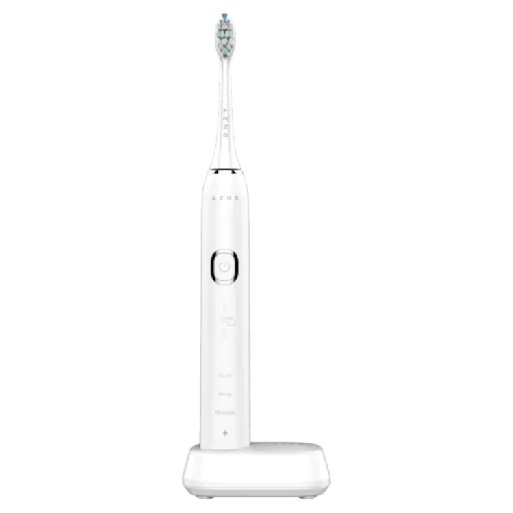 Front view of the White Aeno DB3 Smart Sonic electric toothbrush in the charging base on a white background
