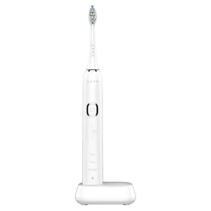 Front view of the White Aeno DB3 Smart Sonic electric toothbrush in the charging base on a white background