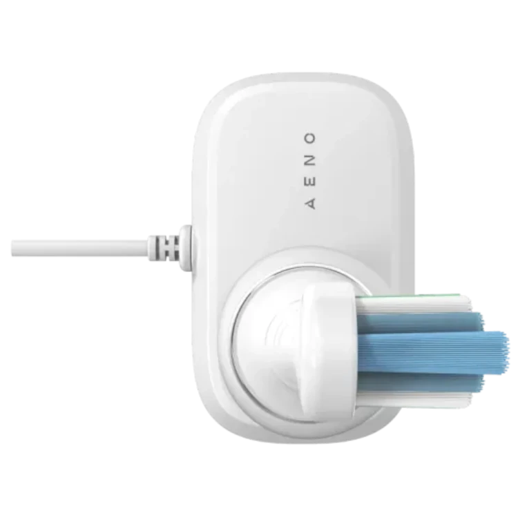 Top view of the White Aeno DB3 Smart Sonic electric toothbrush with blue bristles on a white background