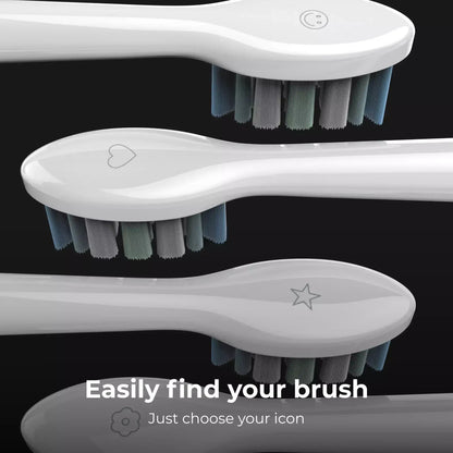 Three white toothbrushes with different bristle patterns on a black background