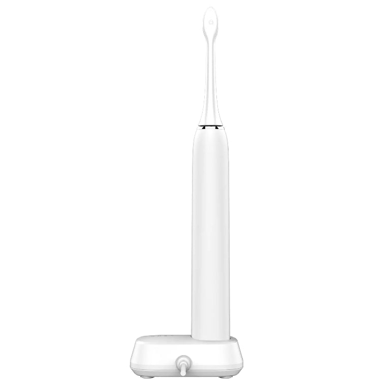 Rear view of the White Aeno DB5 Sonic Electric Toothbrush on wireless charging station