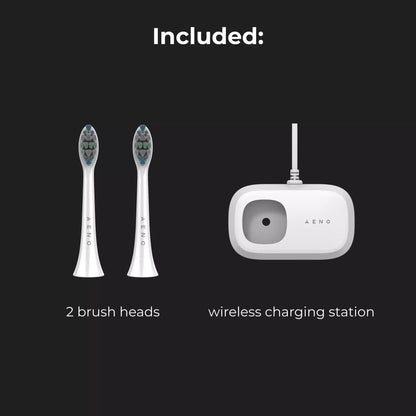Aeno DB5 electric toothbrush set with two brush heads and a wireless charging station on a black background.