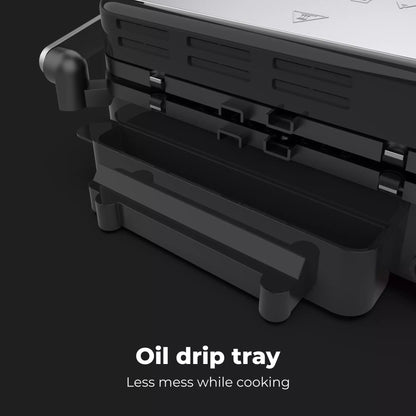 Aeno EG1 Electric Grill oil drip tray with text 'Oil drip tray Less mess while cooking' on a dark background