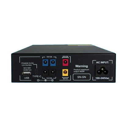 Close-up of the output ports: DC, USB-A, and USB-C.

