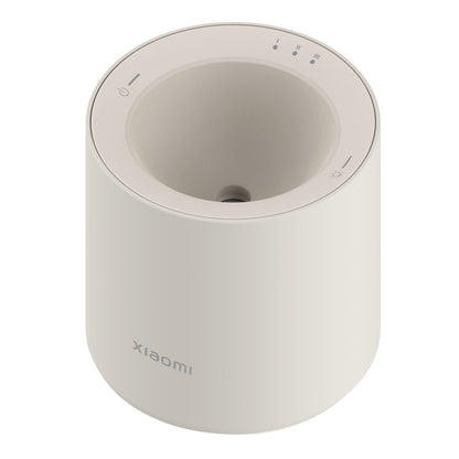Xiaomi Smart Scent Diffuser (Smart App Control, RGB Ambient Lighting, Motion Sensor, 50-Day Battery) in sleek design.