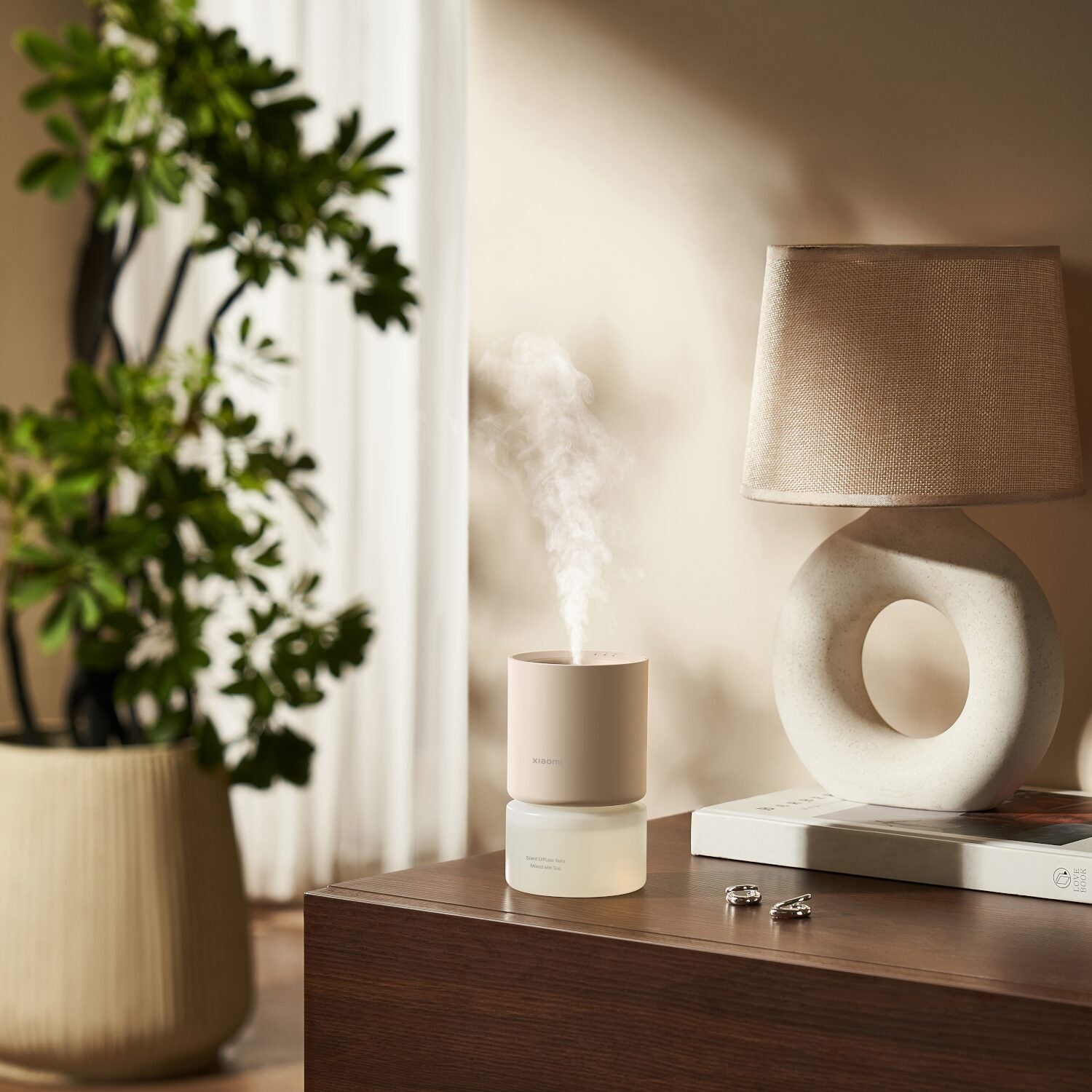 Elevate your space with the Xiaomi Smart Scent Diffuser (Smart App Control, RGB Ambient Lighting, Motion Sensor, 50-Day Battery).