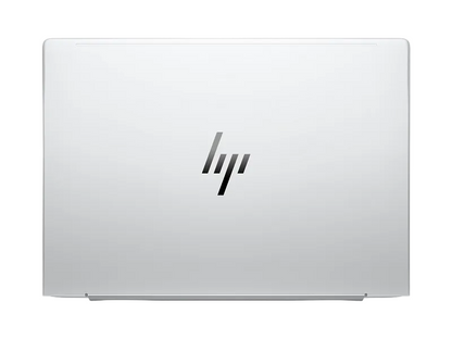 Laptop displaying Windows 11 Pro with Copilot interface.

