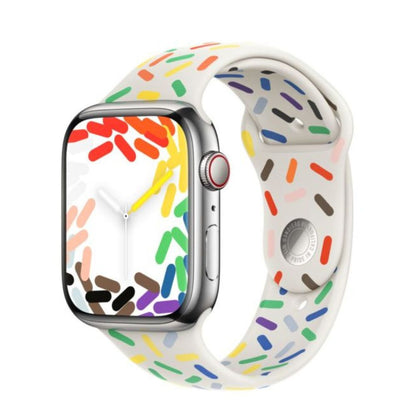 Apple Watch with Pride Edition band worn on wrist
