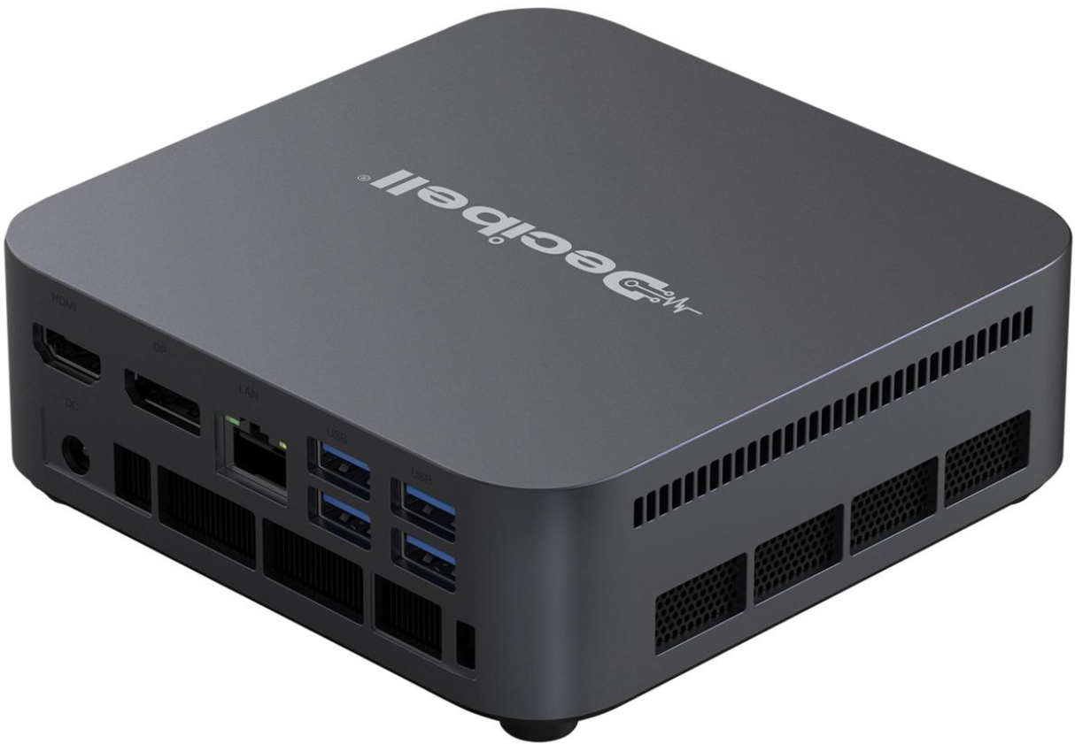 Black computer mini PC with ports on a white background