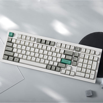 Keychron Q5M-P1 QMK/VIA Wireless Custom Keyboard - Shell White on a sleek background, showcasing its elegant design.