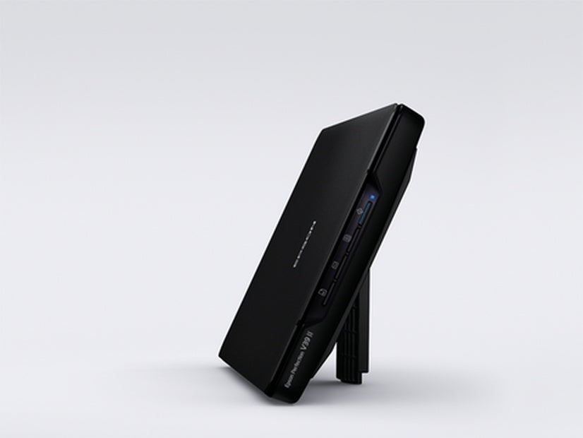 Epson Perfection V39II Photo and document scanner positioned elegantly, ideal for home and office scanning needs.