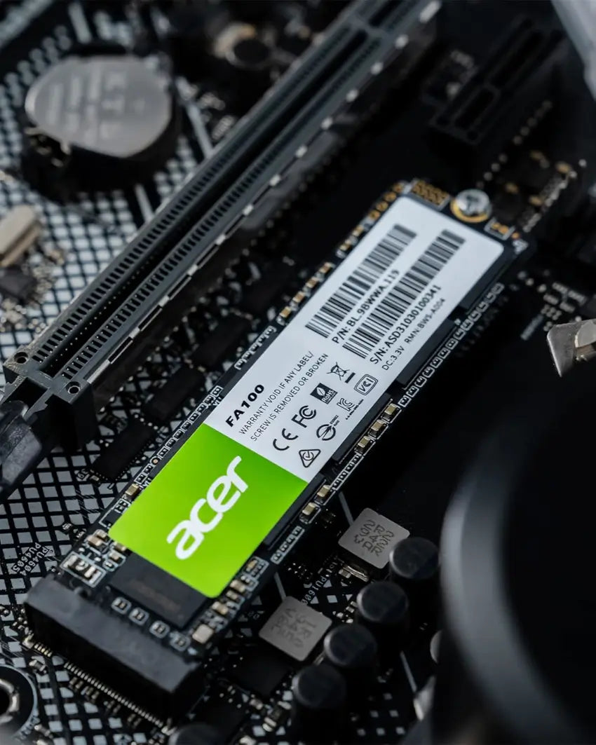 SSD with Acer FA100 logo on a computer motherboard