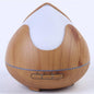 Pyramid Light 300ml Atomiser with LED Mood Lighting in wood finish for calming ambiance and up to 10 hours mist by DC Designs.