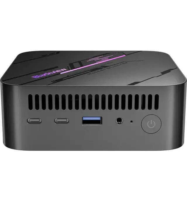 Black mini PC with ports and power button on a white background