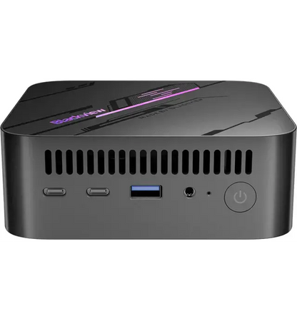 Black mini PC with ports and power button on a white background