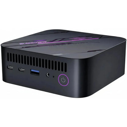 Black mini PC with ports on a white background