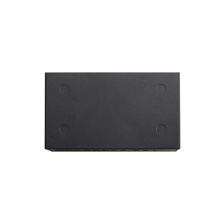 Rectangular black stone with four circular holes on a white background