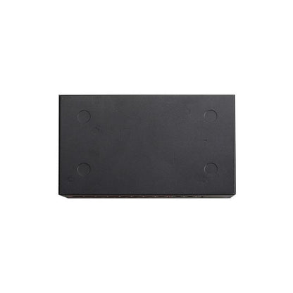Rectangular black stone with four circular holes on a white background