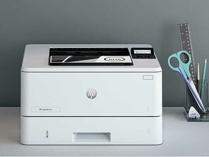 HP LaserJet Pro 4003Dn - High Speed Duplex Printing, compact white HP printer on desk with scissors and ruler